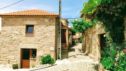 an alleyway in an old stone house at Aldeia de Moura Morta in Moura Morta