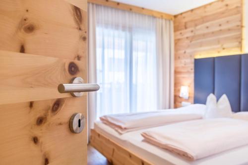 Ένα ή περισσότερα κρεβάτια σε δωμάτιο στο Superior Apartments Marialisa Rose