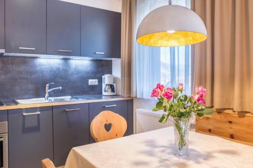 Η κουζίνα ή μικρή κουζίνα στο Superior Apartments Marialisa Rose