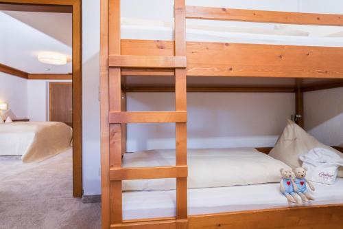 Postel nebo postele na pokoji v ubytování Alpen-Comfort-Hotel Central