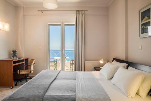 Кровать или кровати в номере Rhakotis Villa