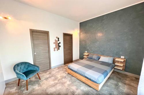Posteľ alebo postele v izbe v ubytovaní Ubertini House