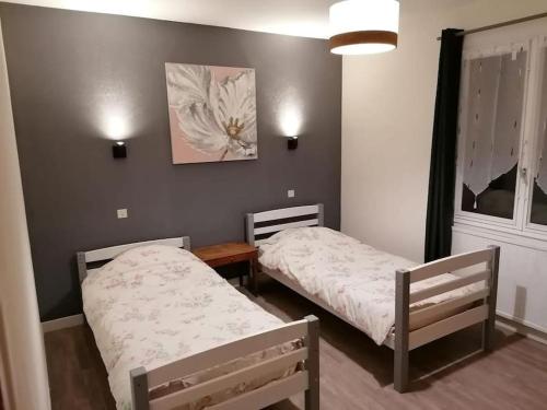 Posteľ alebo postele v izbe v ubytovaní Gîte de la traverse, 2 à 6 personnes