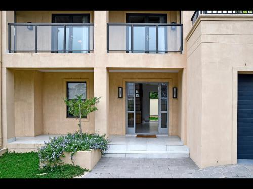 a facade of a building with a glass door at Small Wonder in Franschhoek