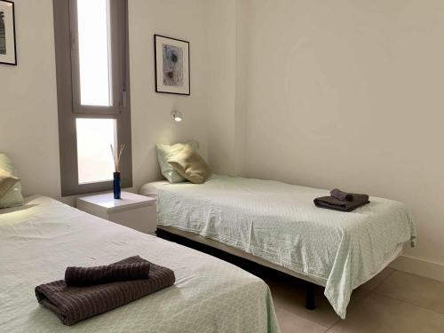 Postel nebo postele na pokoji v ubytování Penthouse with stunning sea views in Torrox
