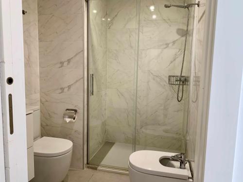 Koupelna v ubytování Penthouse with stunning sea views in Torrox