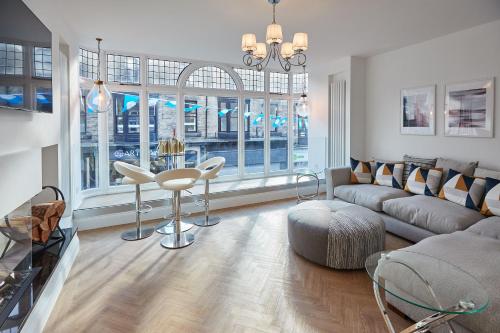a living room with a couch and a table at Host & Stay - Oxford House in Harrogate