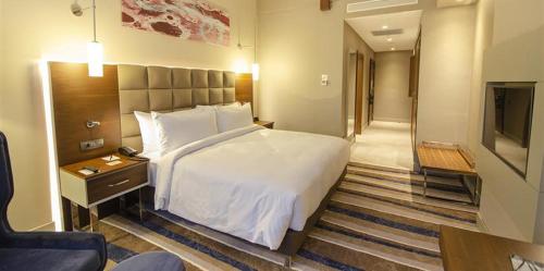 Katil atau katil-katil dalam bilik di Questa Thermal & Spa Hotel