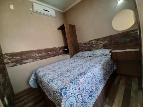 Katil atau katil-katil dalam bilik di Uma agradável morada para descansar em Itapirubá!