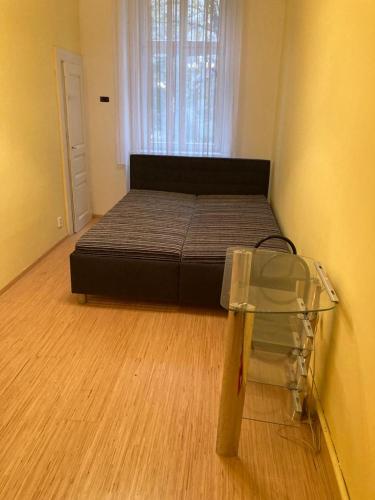 Posteľ alebo postele v izbe v ubytovaní Útulné bydlení 10 min pěšky do centra Prahy