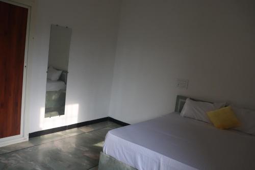 Cama o camas de una habitación en Sukh Sagar Homestay