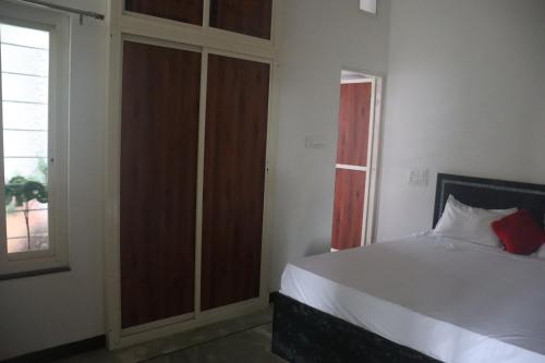 Cama o camas de una habitación en Sukh Sagar Homestay