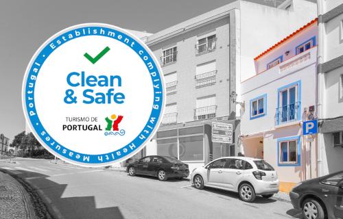 a sign for a clean and safe car dealership at Tamar Apartments in Lagos