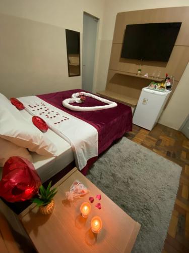 Łóżko lub łóżka w pokoju w obiekcie Grande Hotel Minas Gerais