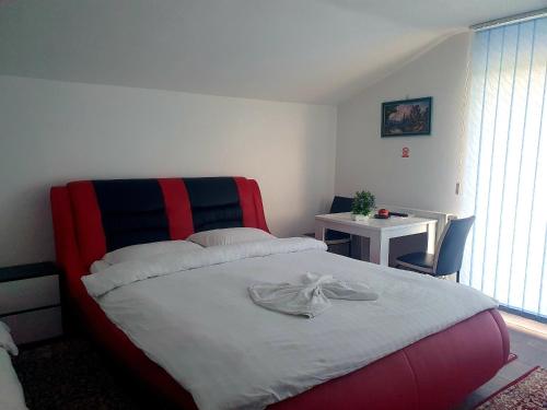 Ένα ή περισσότερα κρεβάτια σε δωμάτιο στο MOTEL ALADIN