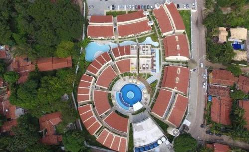an overhead view of a building with a blue center at Solar Água Pipa 125 in Pipa