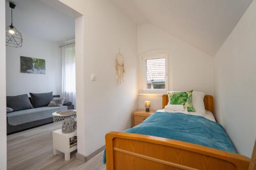 Ένα ή περισσότερα κρεβάτια σε δωμάτιο στο Apartament Regina