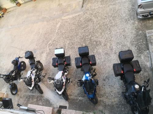a group of motorcycles parked on a street at B&B San Francesco in Nicosia