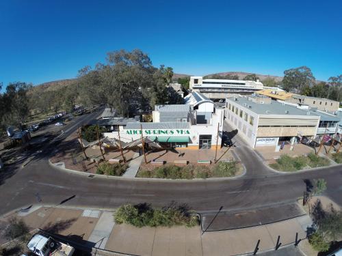 an aerial view of a city with a building at YHA Alice Springs in Alice Springs