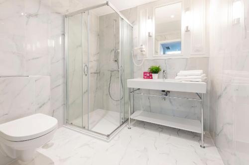 Koupelna v ubytování VacationClub - Baltic Park Fort Apartament G.506