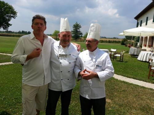 a group of three chefs standing next to each other at Il Rifugio del Poeta in San Biagio di Callalta