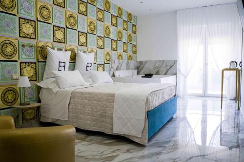 Un pat sau paturi într-o cameră la EF Luxury Living