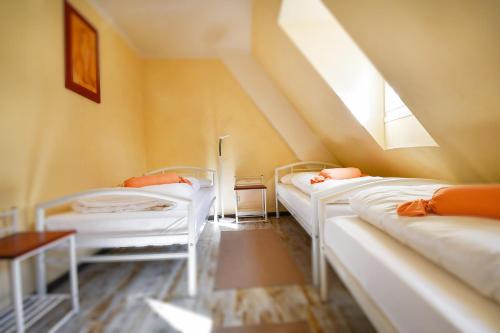 Una cama o camas en una habitación de Historia Hotel