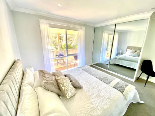 Ένα ή περισσότερα κρεβάτια σε δωμάτιο στο Relaxing 3 bedroom house with 2 bathrooms.