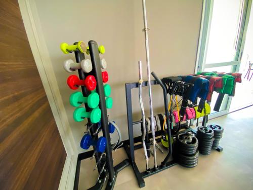 a rack with many different tools in a room at Hotel Rainha do Brasil in Aparecida