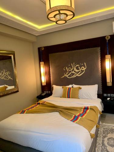 a hotel room with two beds in a room at Villa Margaux in Essaouira
