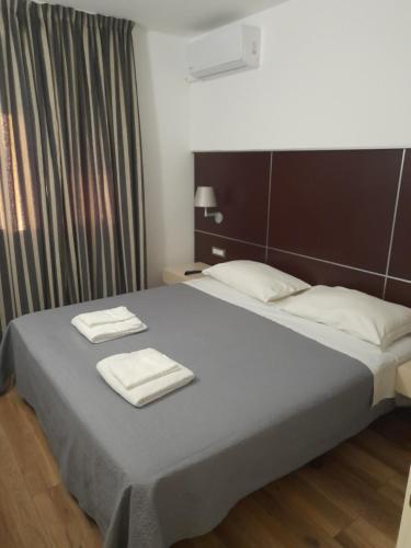 A bed or beds in a room at Jolly casa 1