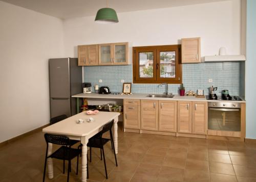 Kuchyň nebo kuchyňský kout v ubytování Persephone's Villa