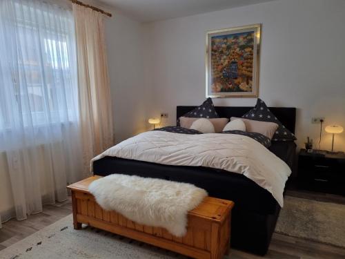 Llit o llits en una habitació de Appartement Bergsee FAMILY - direkt am See - Seeblick