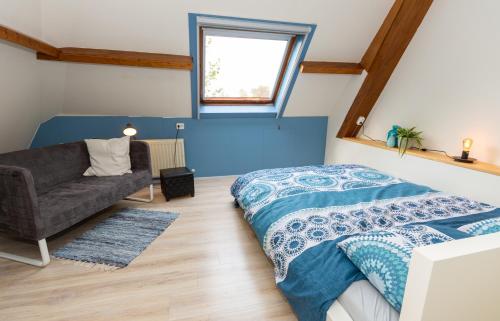 Postel nebo postele na pokoji v ubytování Vakantiehuis met fraai uitzicht