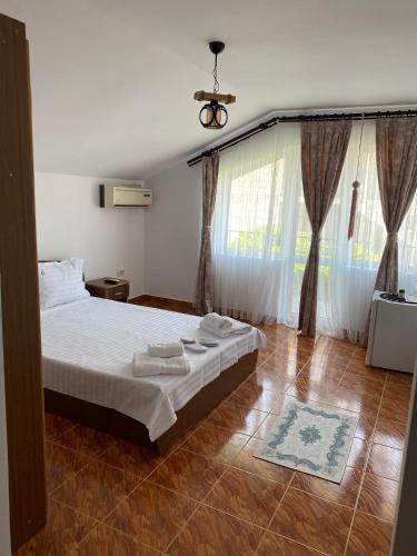 Un pat sau paturi într-o cameră la Casa Amos