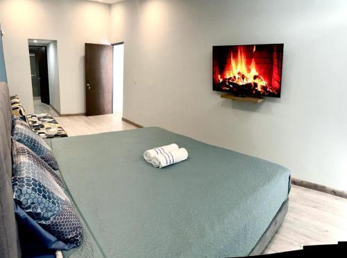 Voodi või voodid majutusasutuse 3210 Luxury Room in Bogotá toas
