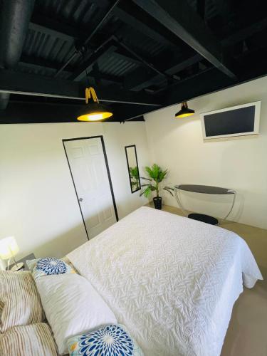 Una cama o camas en una habitación de Vista del Pacifico.