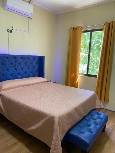 Postel nebo postele na pokoji v ubytování Intimo Hotel Los Heroes