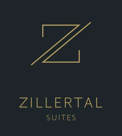 a gold letter z logo on a black background at Zillertal Suites in Kaltenbach