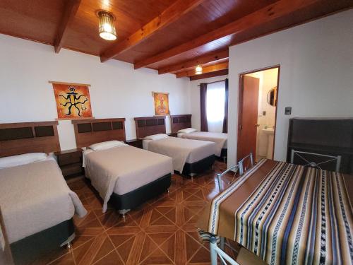 Cama ou camas em um quarto em Lalck Cketi Hospedaje y Turismo