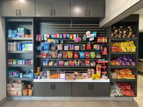 a grocery store filled with lots of food and drinks at Studio 6 Suites Stockton, CA Waterfront in Stockton