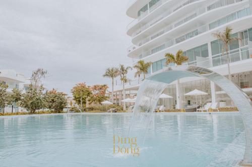 a rendering of the pool at the disneyland resort at Máritima Golf New apartment private beach access in Nuevo Vallarta 