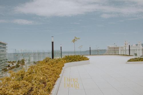 a sidewalk with the words dino dark written on it at Máritima Golf New apartment private beach access in Nuevo Vallarta 
