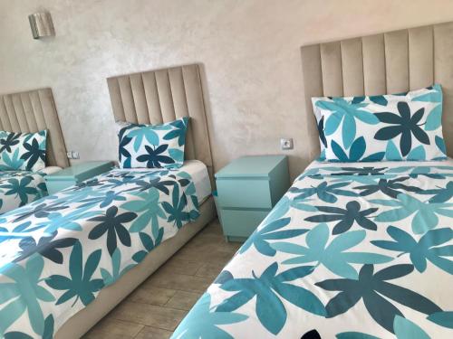 Marbella Beach location pour famille 2 chambresにあるベッド