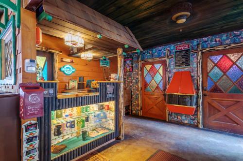 a room with a play room with a door and a room at Hicksville Pines Chalets & Motel in Idyllwild
