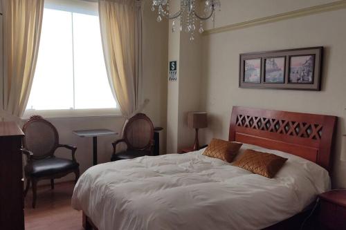 Postel nebo postele na pokoji v ubytování Residencial Kontiki Miraflores