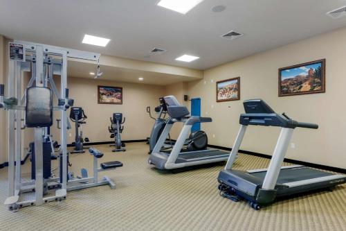 a gym with treadmills and elliptical machines at Best Western PLUS Bryce Canyon Grand Hotel in Bryce Canyon