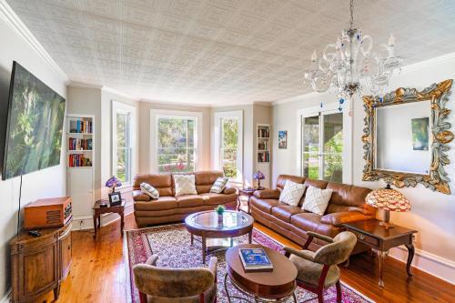 a living room with a couch and a table at The Estate at Mt Dora in Mount Dora