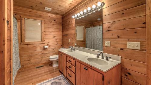 a bathroom with a sink and a toilet at Finding Grace in Blue Ridge