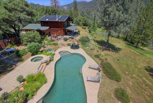 an aerial view of a house with a slide at Manzanita Ridge Estate by Bnb Yosemite in Mariposa